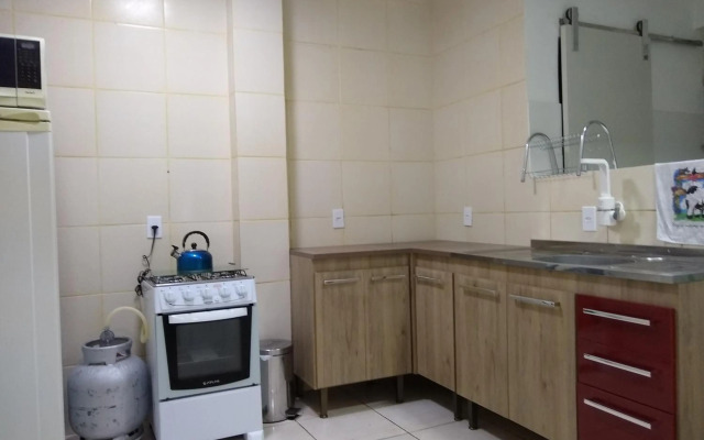 Quarto aconchegante em Apê, no Calçadão