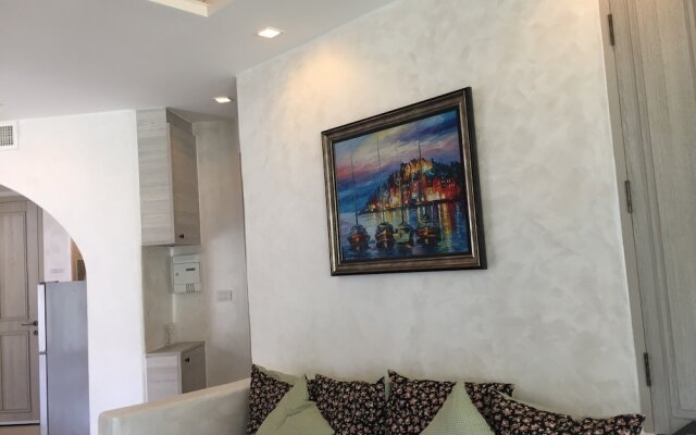 The Che Pool Access Beachfront Condo by Away