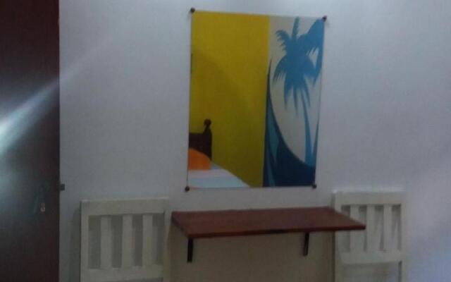 Malika's Yellow House