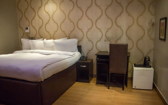 Triple Tee Hotel