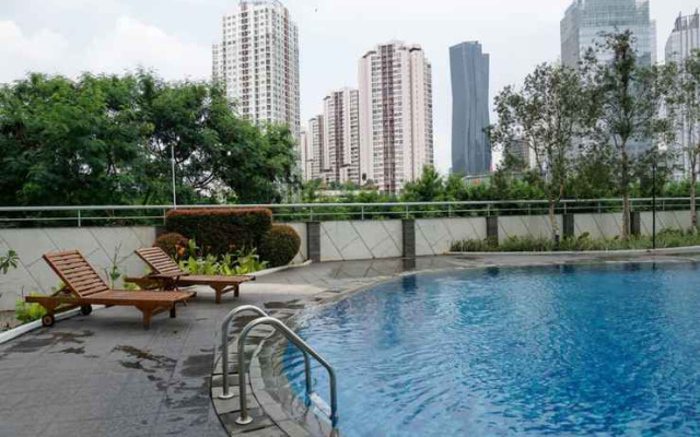 Best Location 2BR Apartment at The Wave Kuningan By Travelio