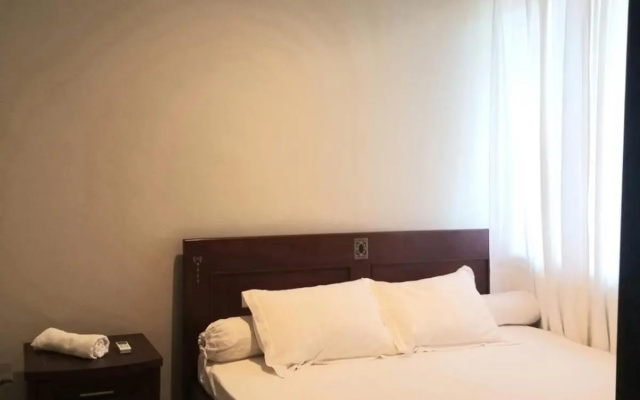 Womy Homy – Guest Rooms – Central Karang