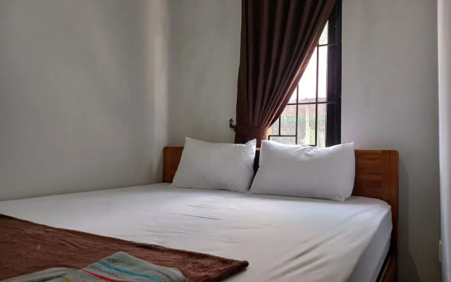 SPOT ON 92515 Timoti Guest House
