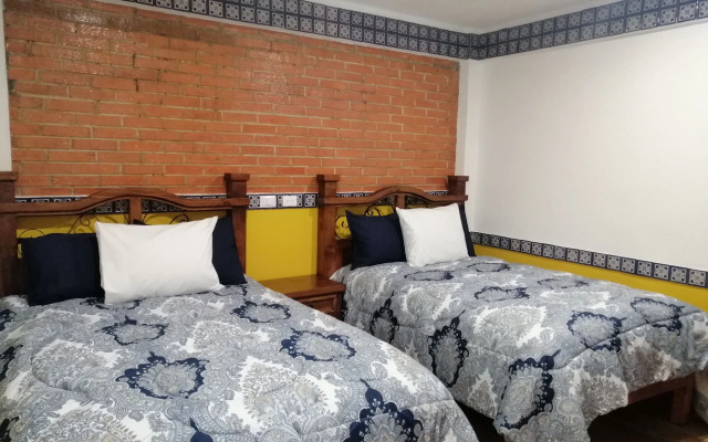 Hotel y Suites Axolotl