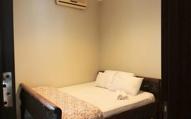 Womy Homy – Guest Rooms – Central Karang