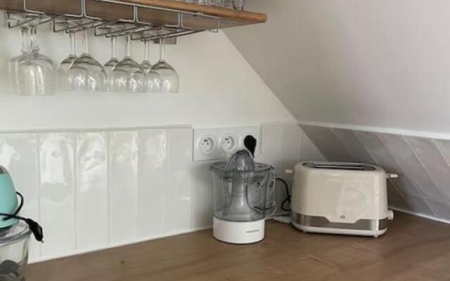 Appartement cosy sous les toits