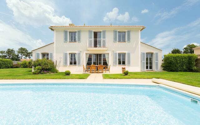 Spacious villa with private swimming pool near a golf course