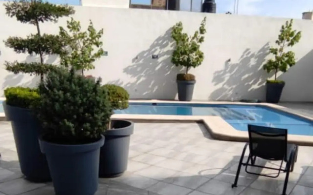 Tu joya Tapatia - Apartamento con alberca y aire acondicionado
