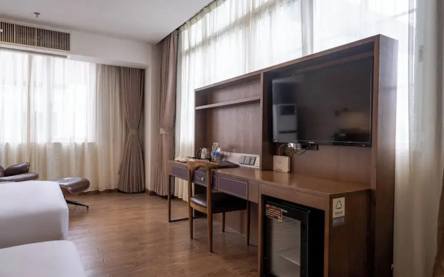 Xingyi Chain Hotel Jiangxia Metro Station