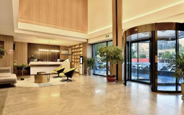 New Century Manju Hotel Linan