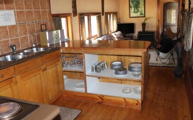 Krinklewood Cottage and Train Carriages