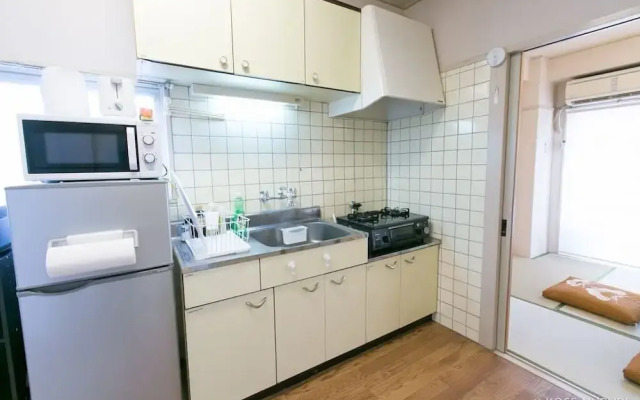 Aki Building 402