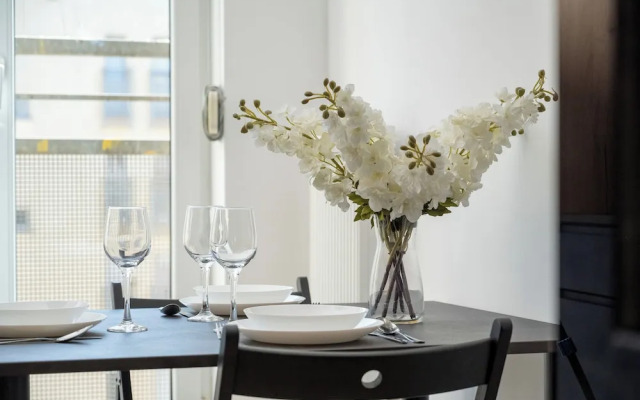 Wroclaw Dark Blue Apartment by Renters