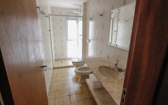 150m da praia com piscina aquecida e sauna