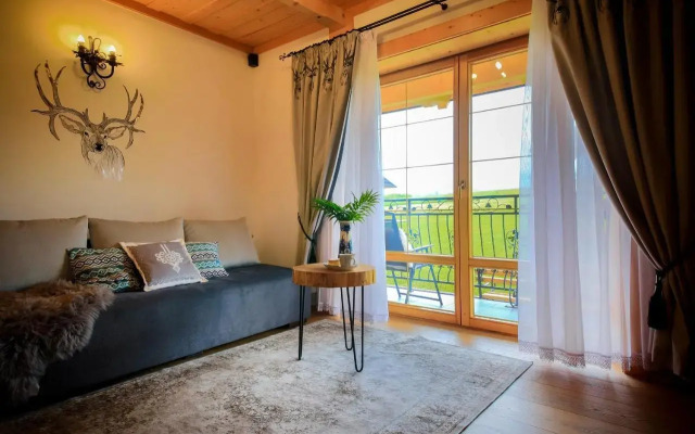 Folk Resort Domki i Apartamenty