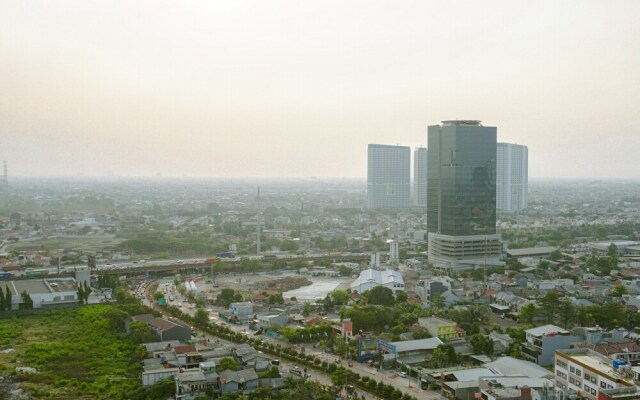 Clean and Homey 1BR at Puri Garden Apartment