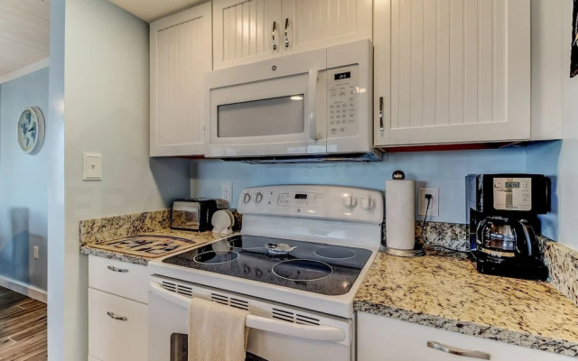 Newly Remodeled Oceanfront Condo with Salt Water Pool and Private Walkway to Beach by RedAwning