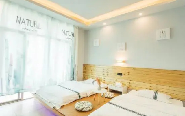 Weizhou Island Waibang Seaview Homestay (Colorful Beach Firefly Sports Base)