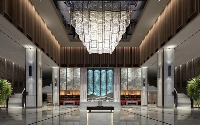 Xinzheng Xingangwanhua Hotel