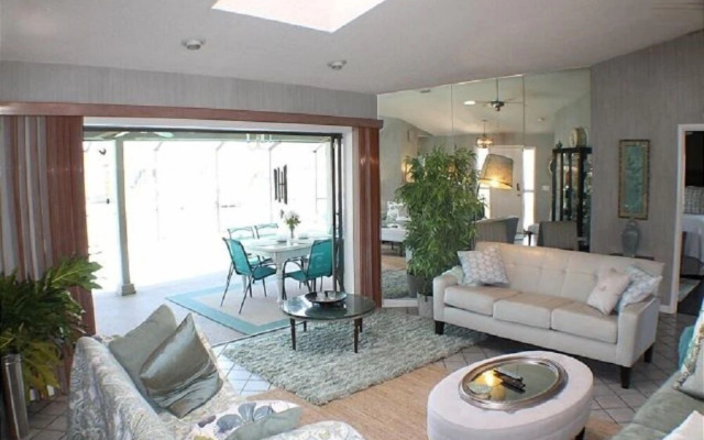 Waterfront vacation home with solar heated pool by Redawning