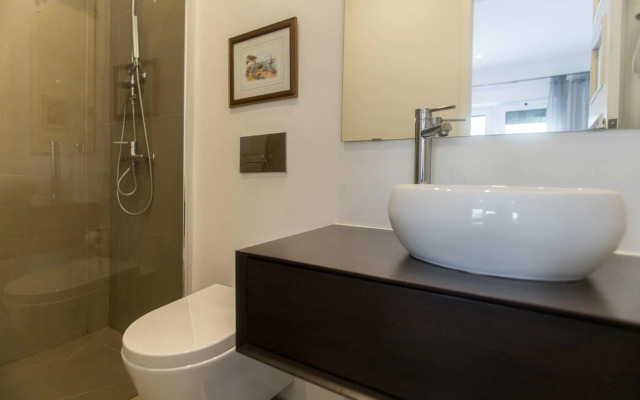 Almada Studios & Suites