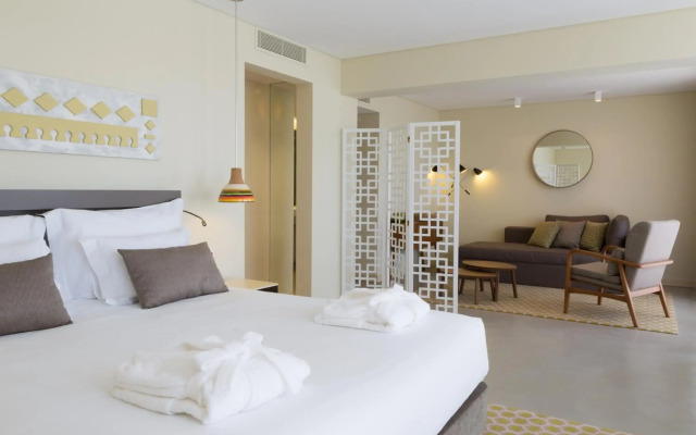 Ozadi Tavira Hotel