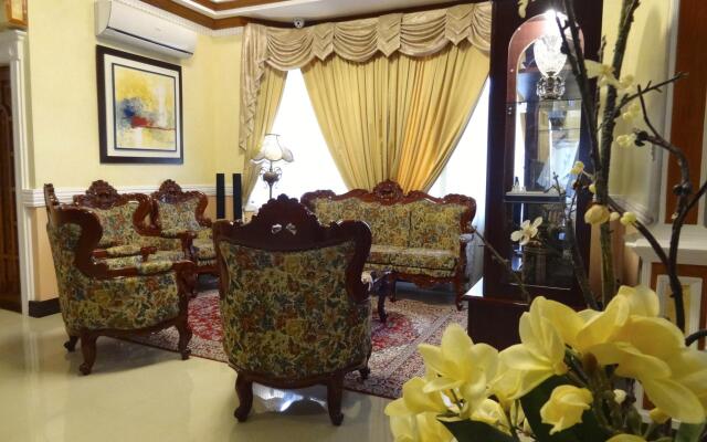 The Executive Villa Inn & Suites