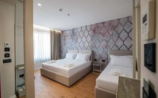 Ermes Deluxe Triple Room