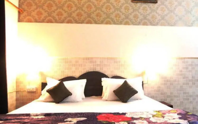 Mangalam Palace By OYO Rooms