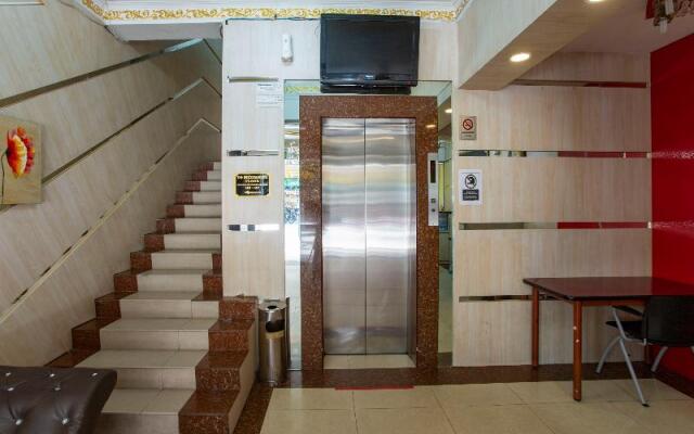 Capital O Hotel Grand Orchard