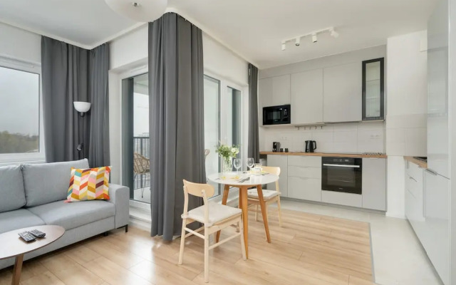 Gray Cosy Studio in Poznań by Renters
