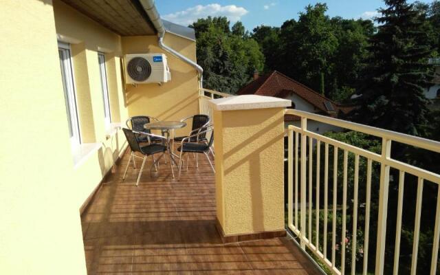 Aqualiget-Apartmanház