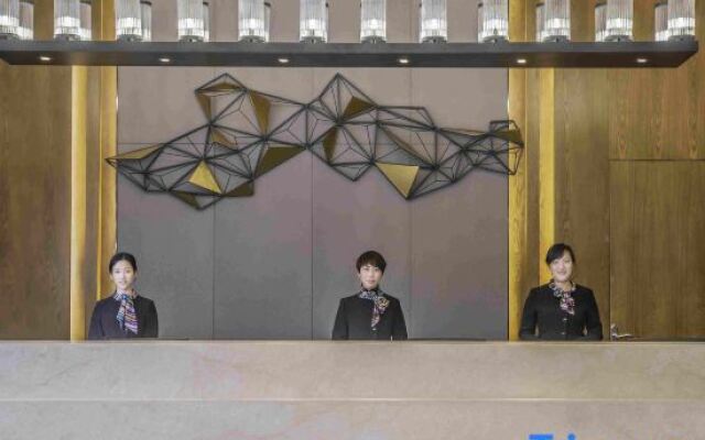 Fengyang Xinmilan International Business Hotel