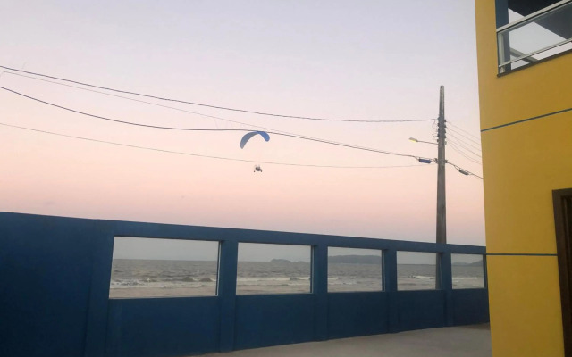 PÉ NA AREIA apartamento térreo