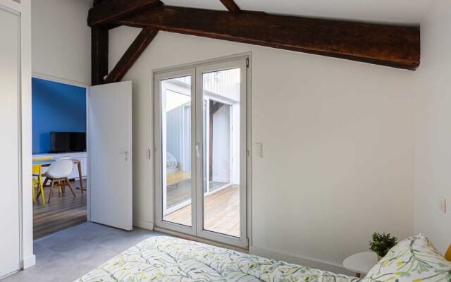 Bright 2BR Loft With a Quiet Patio