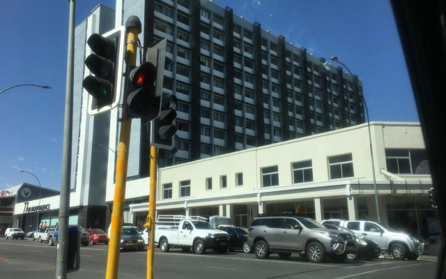 Highrise Windhoek apartment with skyline view, pool and gym