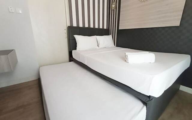 Homey And Cozy Living Studio Amartha View Apartment