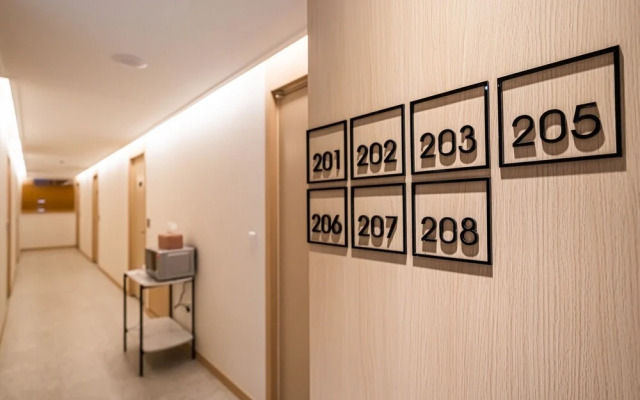 Osan Hotel Raum