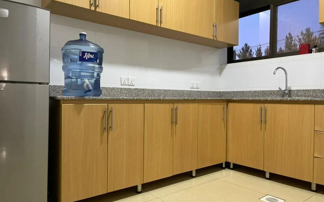 The Mugabi's Spacious Private Room