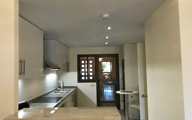 Casares Beach Golf Apartment With Private Garden and Pool Access