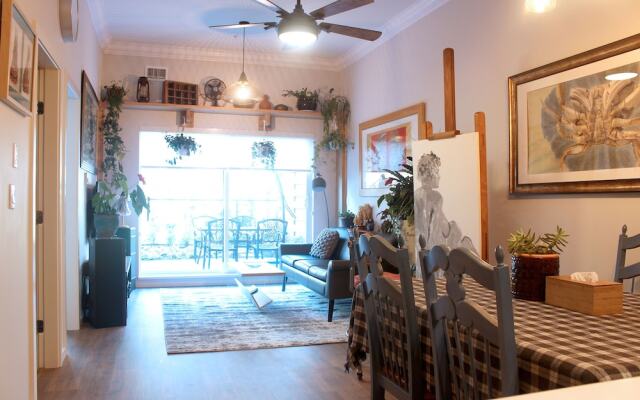 Eclectic Boho-Chic Flat & Patio by Elevate Rooms