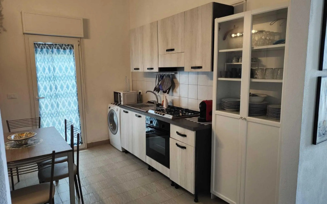 Seafront Apartment in Villa with Swimming Pool and Parking