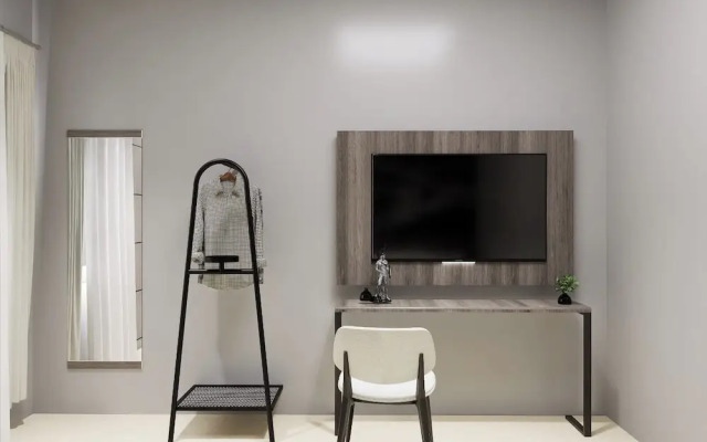 Darmo Inn By News Hotel