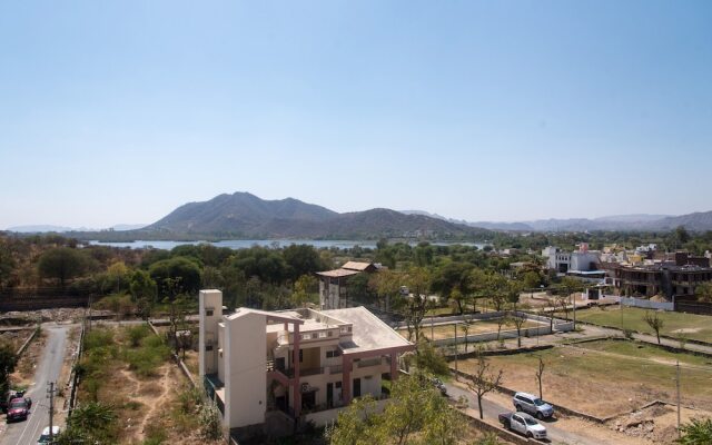 OYO 12250 Home Kesar Vilas near Trident Udaivilas