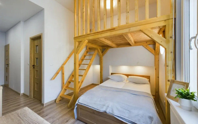 Wooden Cracow Apartment by Renters