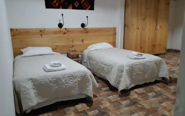 Peumayen Atacama / Hostal & Cabaña