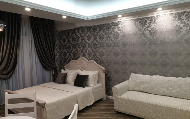 Апартаменты на Учительской 33