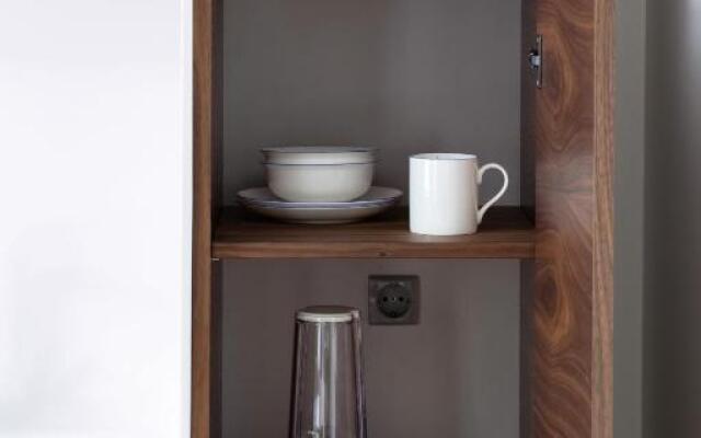 Design Central Studio Apartment with Balcony by Hostlovers