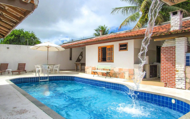 Casa com 4 Suítes, Piscina, Área Gourmet e Wifi
