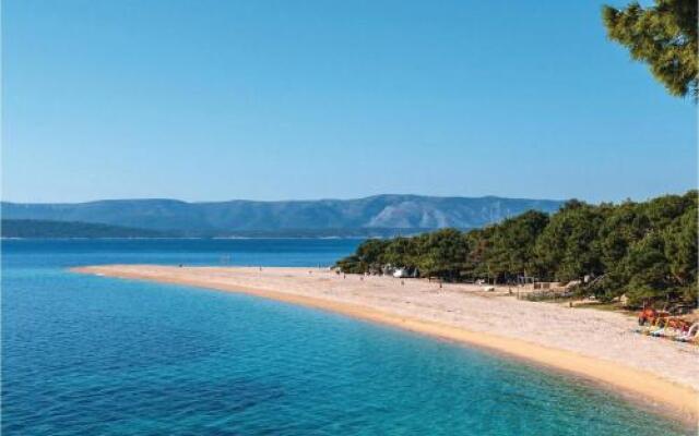 Four-Bedroom Holiday Home in Milna